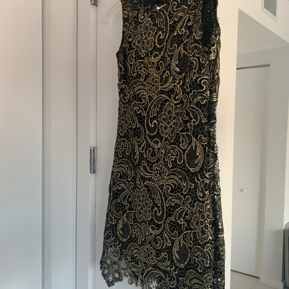 Black and Gold Dress with open back design